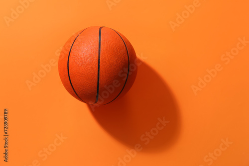 Basketball ball on orange background