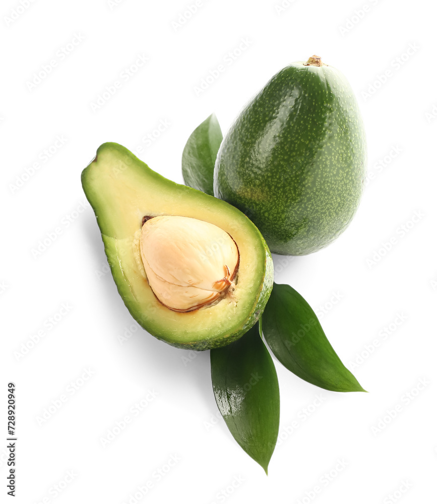 Fresh ripe avocados and leaves on white background Fresh ripe avocados and leaves on white background