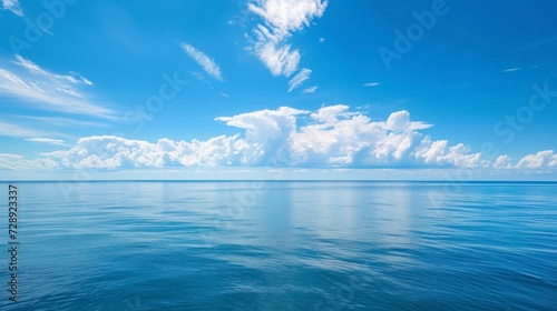 beautiful blue ocean in the middle of the sea with a beautiful sky