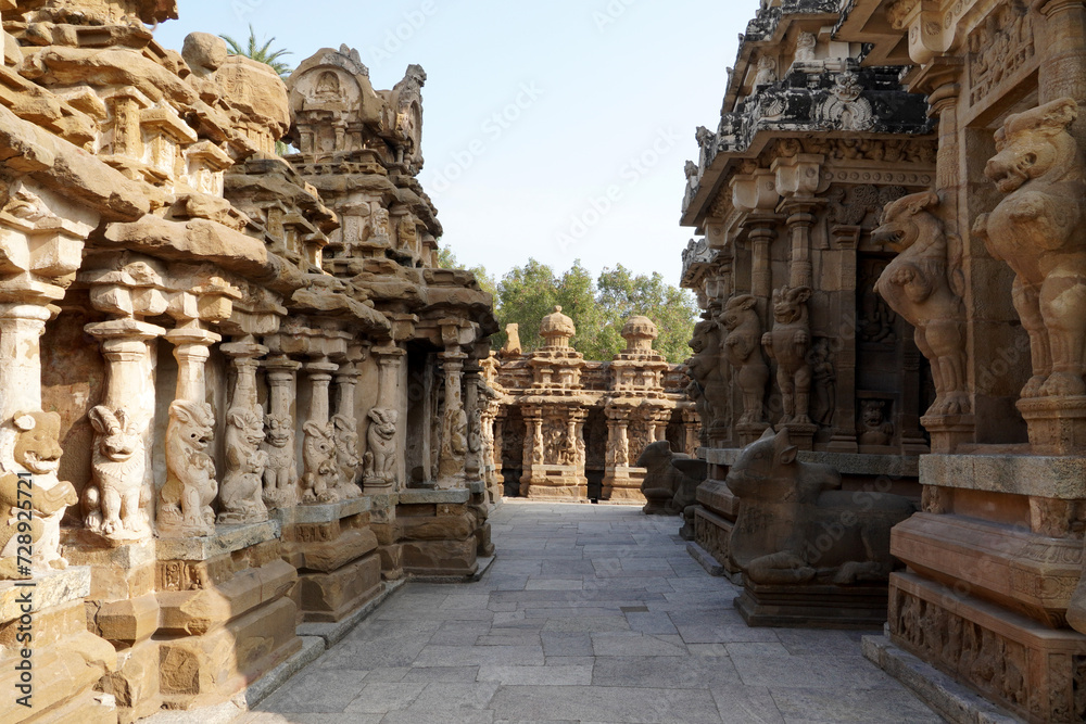 Small shrines with lion sculptures in the row of pillars in ancient Kanchi Kailasanathar temple in Kanchipuram, Tamil nadu. Sandstone carved mythical statues in Temple columns.