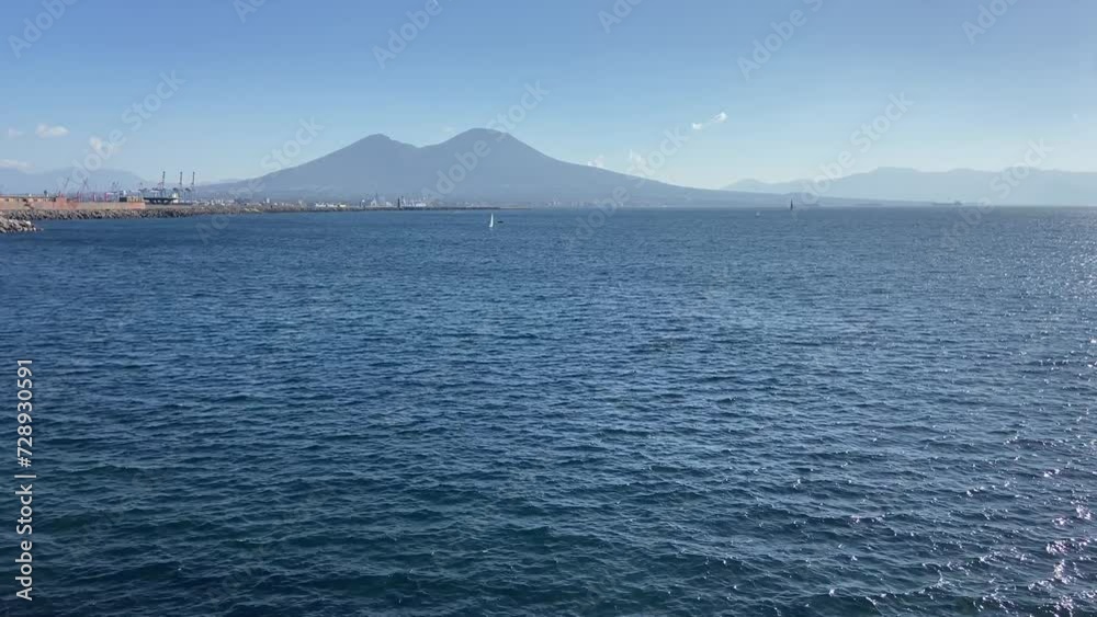 Beautiful Vesuvius volcano seen from the port of Naples on a sunny day Beautiful Vesuvius volcano seen from the port of Naples on a sunny day