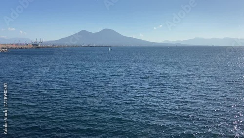 Beautiful Vesuvius volcano seen from the port of Naples on a sunny day photo