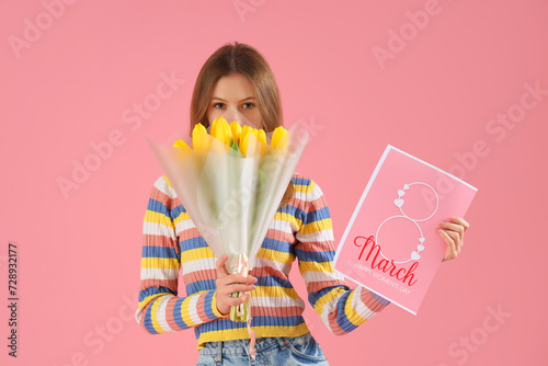 Young woman with bouquet of...