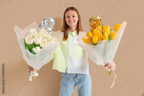 Young woman with bouquets o...