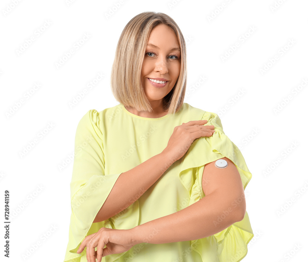 Diabetic woman with glucose sensor on white background Diabetic woman with glucose sensor on white background