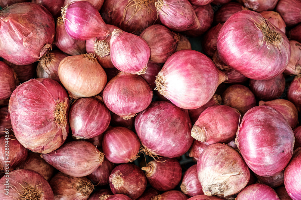 Red onions at the traditional market in Thailand Red onions at the traditional market in Thailand