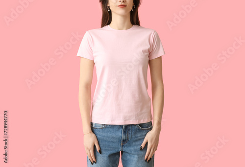 Young woman in stylish pink...