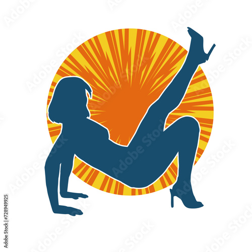 Silhouette of a sexy female doing seductive dance