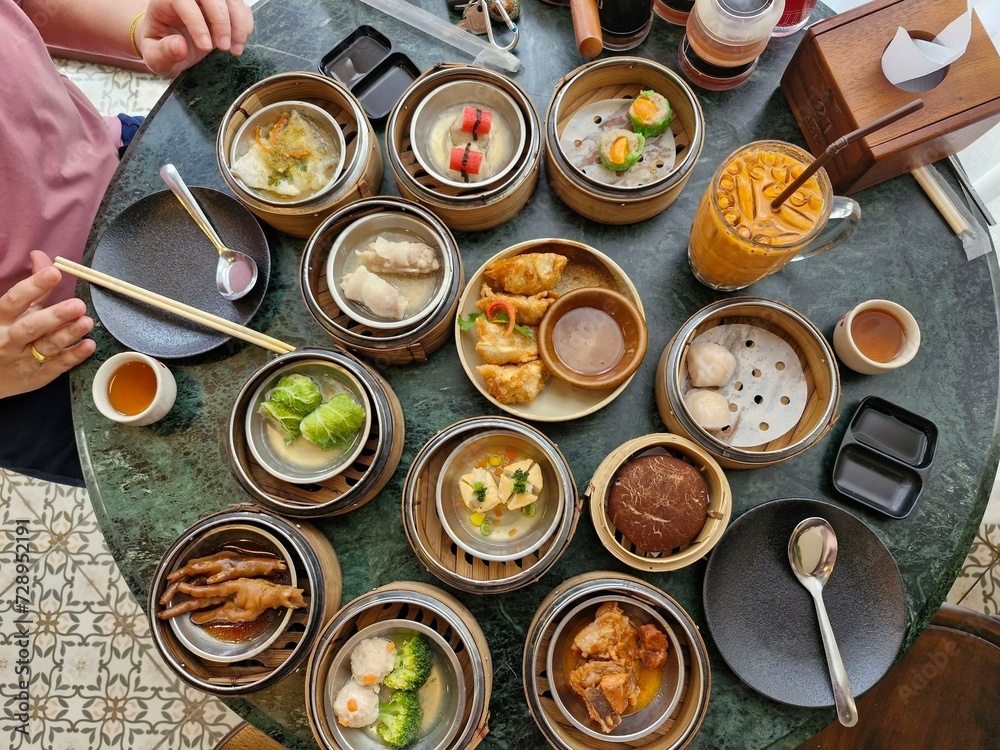 Top view of dim sum, a popular Asian breakfast dish. Top view of dim sum, a popular Asian breakfast dish.