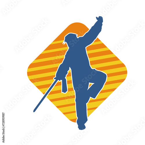 Silhouette of a kungfu or wushu martial art athlete in action pose. Silhouette of a male martial art person in pose with swords weapon.