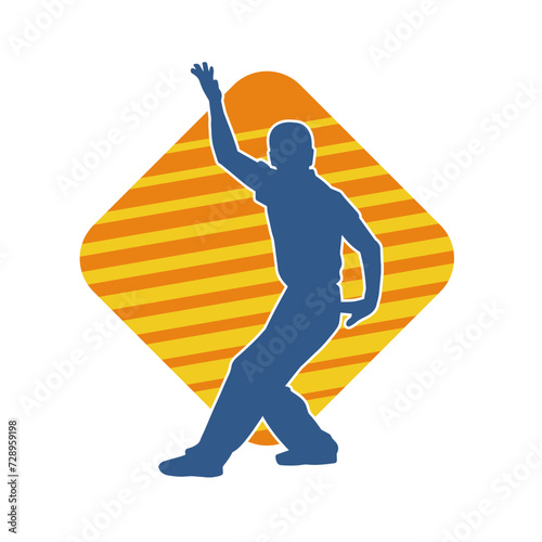 Silhouette of a man in oriental martial art pose. Silhouette of a male in martial art move.