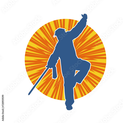 Silhouette of a kungfu or wushu martial art athlete in action pose. Silhouette of a male martial art person in pose with swords weapon.