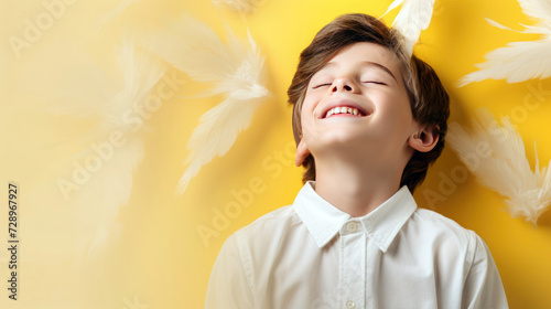 Sunny Easter Happiness: Smiling Child Delighted by the Festive Season on a Warm Yellow Background with a Spacious Canvas for Creative Content