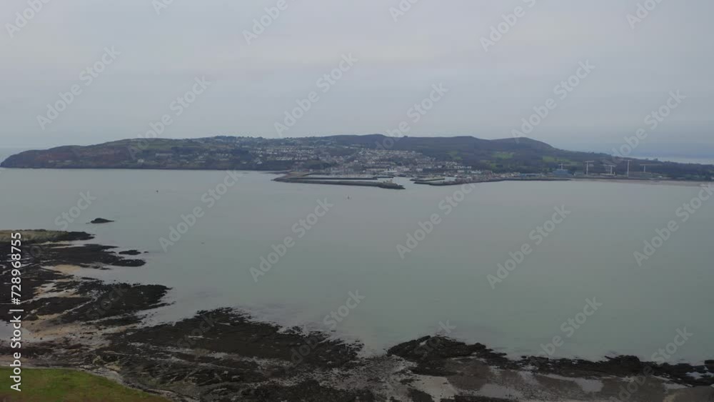 Aerial tracking shot. Vast vista of Howth from Ireland's Eye. Twilight Aerial tracking shot. Vast vista of Howth from Ireland's Eye. Twilight
