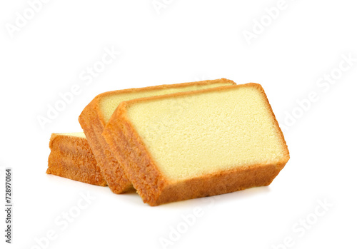 Butter cake sliced on white background