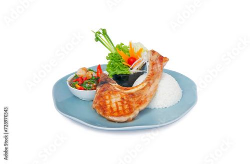 Grilled or pan fried pork chop with lychee and Thai basil sauce.Fusion food on white background