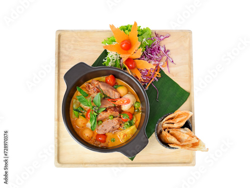 Thai red curry with roasted duck(Kaeng phed phed yang)on white background,Top view