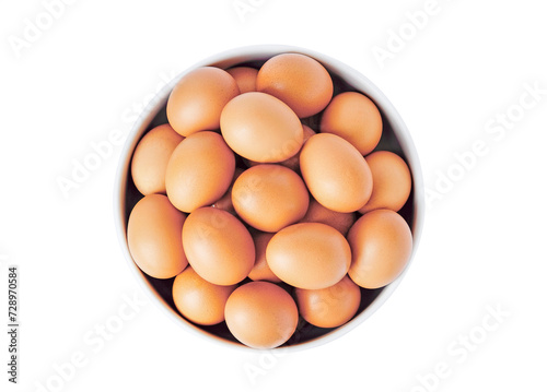 Top view of raw brown eggs on bowl isolated on white background.