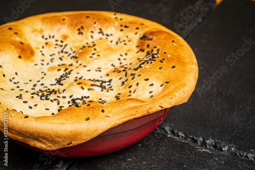 fresh flatbread on the black background