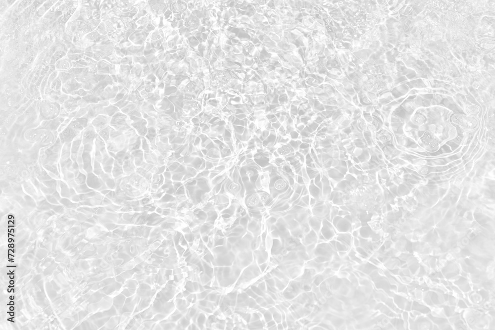 White water with ripples on the surface. Defocus blurred transparent white colored clear calm water surface texture with splashes and bubbles. Water waves with shining pattern texture background. White water with ripples on the surface. Defocus blurred transparent white colored clear calm water surface texture with splashes and bubbles. Water waves with shining pattern texture background.