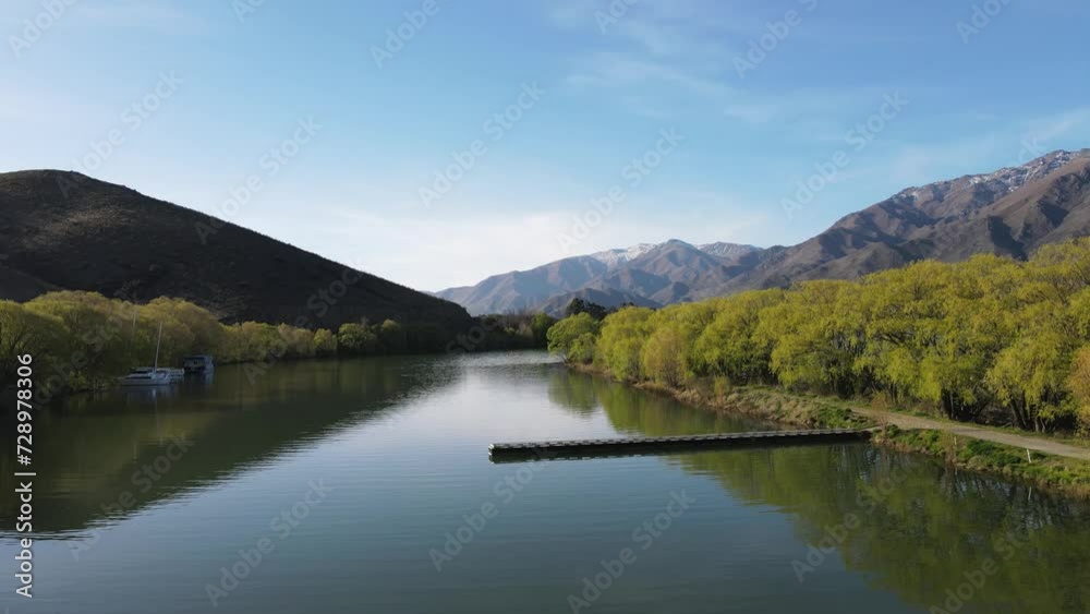 Aerial walkthrough at Sailors cutting in the South Island of New Zealand. Beautiful autumn scene at lake Benmore