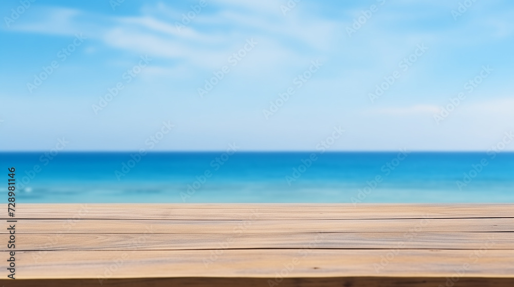 The empty wooden table top with a blurred background of the sea