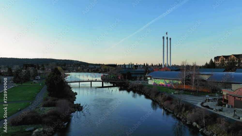 Drone shot through the Old Mill District of Bend, Oregon during sunrise. Drone shot through the Old Mill District of Bend, Oregon during sunrise.
