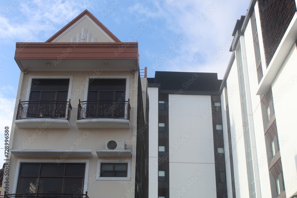 View from outside, perspective of windows in an apartment or flat. suitable for building and architectural themes View from outside, perspective of windows in an apartment or flat. suitable for building and architectural themes
