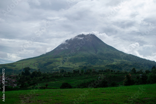 view of Mount Sinabung after light rain © Amirhamzah