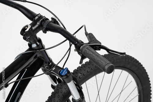Obraz na plátně Black bicycle handlebar isolated on white background