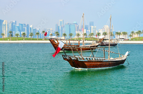 View of Doha waterfront with dhow boats and modern architecture