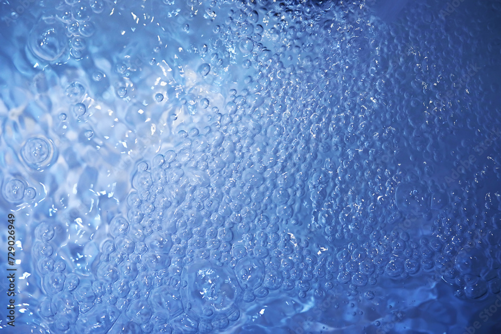 Blue water texture. Bubbles and bubbling water. Blue water texture. Bubbles and bubbling water.