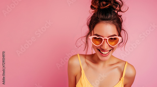 Studio portrait of a cool young woman posing wearing heart shaped love sunglasses