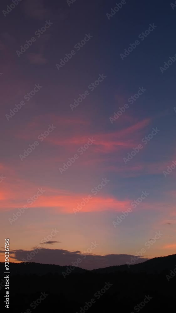Breathtaking scene of the sun setting over the majestic mountains time lapse video, painting the sky with vibrant hues of blue, white clouds, and dramatic sunlight. Breathtaking scene of the sun setting over the majestic mountains time lapse video, painting the sky with vibrant hues of blue, white clouds, and dramatic sunlight.