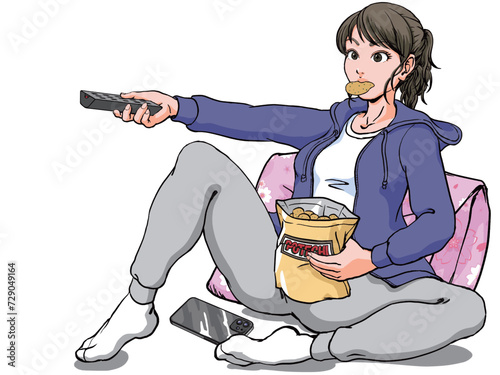 クッションにもたれポテチをかじる_ぐーたらする若い女性