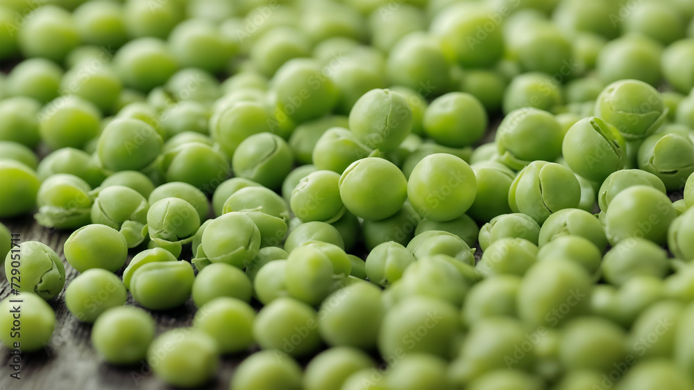A pile of green peas scattered on a wooden surface. A pile of green peas scattered on a wooden surface.