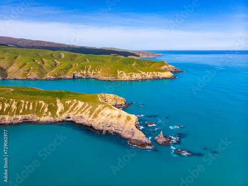 aerial panorama of tumbledown bay, banks peninsula near christchurch, canterbury, new zealand south island