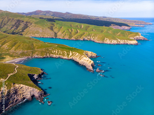 aerial panorama of tumbledown bay, banks peninsula near christchurch, canterbury, new zealand south island