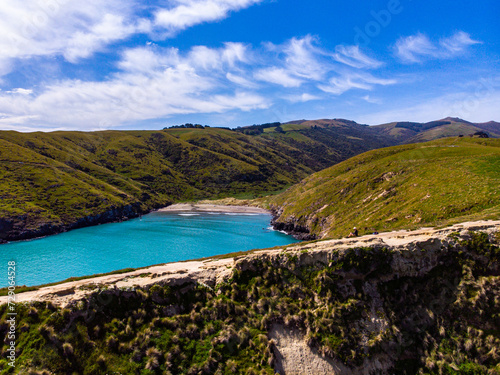 aerial panorama of tumbledown bay, banks peninsula near christchurch, canterbury, new zealand south island