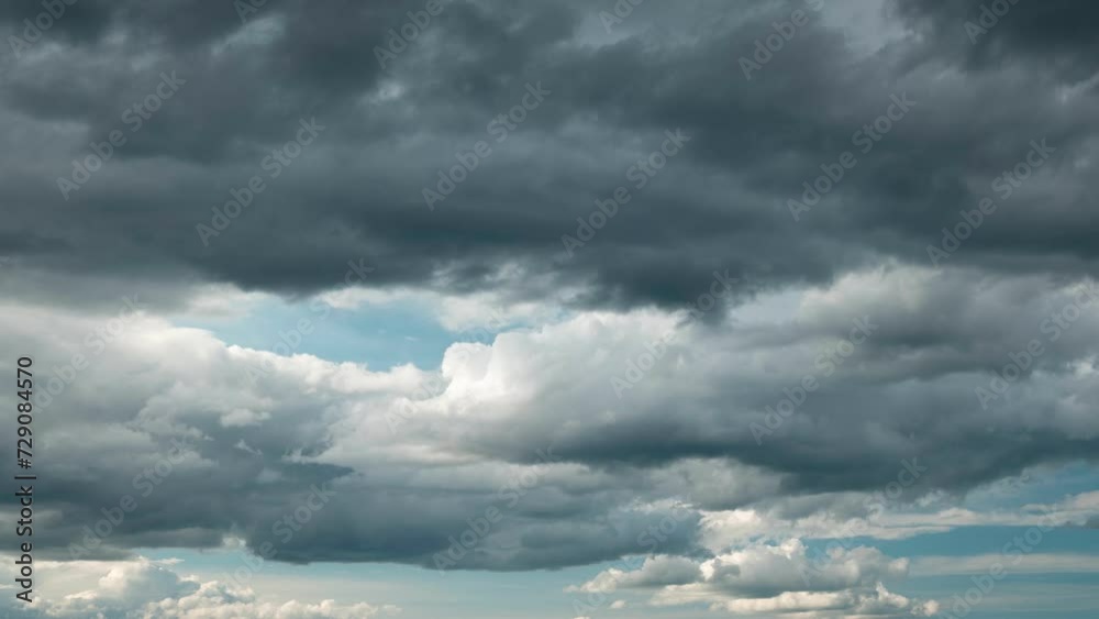 Clouds moving time lapse. Dark stormy clouds covering the whole sky