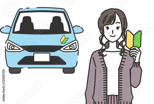 初心者マークを持つ女性
