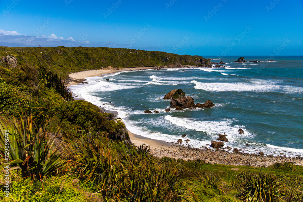 unique landscape of cape foulwind on the west coast of new zealand south island; scenic little bays with large cliffs and rocky islands; cape foulwind walkaway near westport unique landscape of cape foulwind on the west coast of new zealand south island; scenic little bays with large cliffs and rocky islands; cape foulwind walkaway near westport