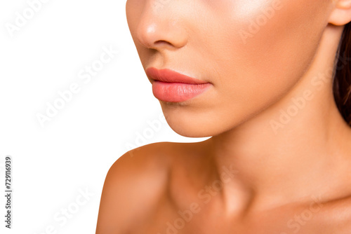 Profile side view cropped close up photo of calm lady with her naked shoulder she isolated on pastel beige background stand half turn to camera