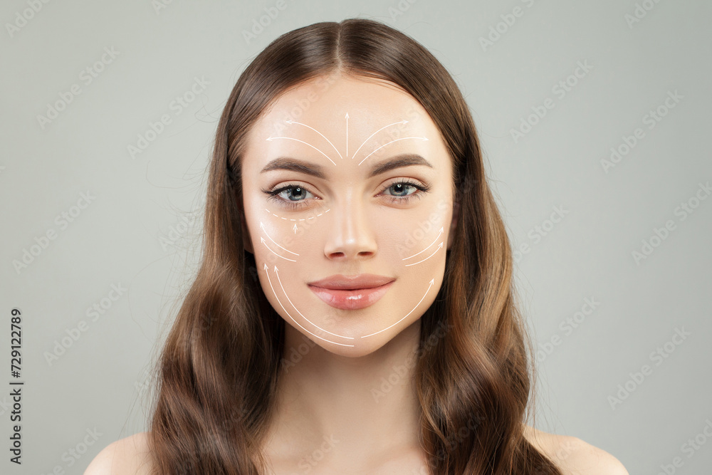 Naklejka premium Grid of lines showing facial lifting effect on fresh skin of beautiful young woman with healthy face looking at camera on white background