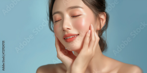 Portrait of beauty asian woman with perfect healthy glow skin facial. photo