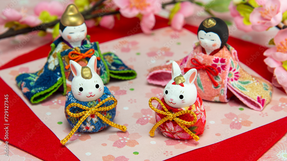 Obraz premium 二種類のミニチュアひな祭りのお雛様とお内裏様