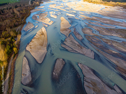 aerial panorama of waimakariri river near christchurch, north canterbury, new zealand; sunset over beautiful river photo