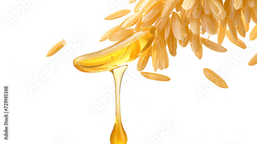 Rice bran oil dripping from rice seed isoalted on white background photo