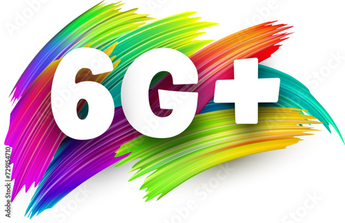 6G+ paper word sign with colorful spectrum paint brush strokes over white.