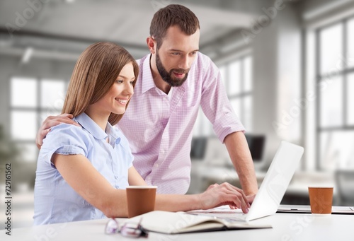 Stressful Couple with Laptop Computer in office